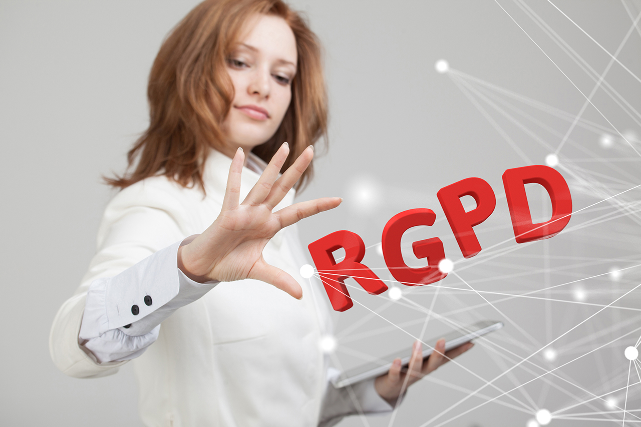 RGPD, Spanish, French and Italian version version of GDPR: Reglamento General de Proteccion de datos. General Data Protection Regulation. Young woman working with personal information.